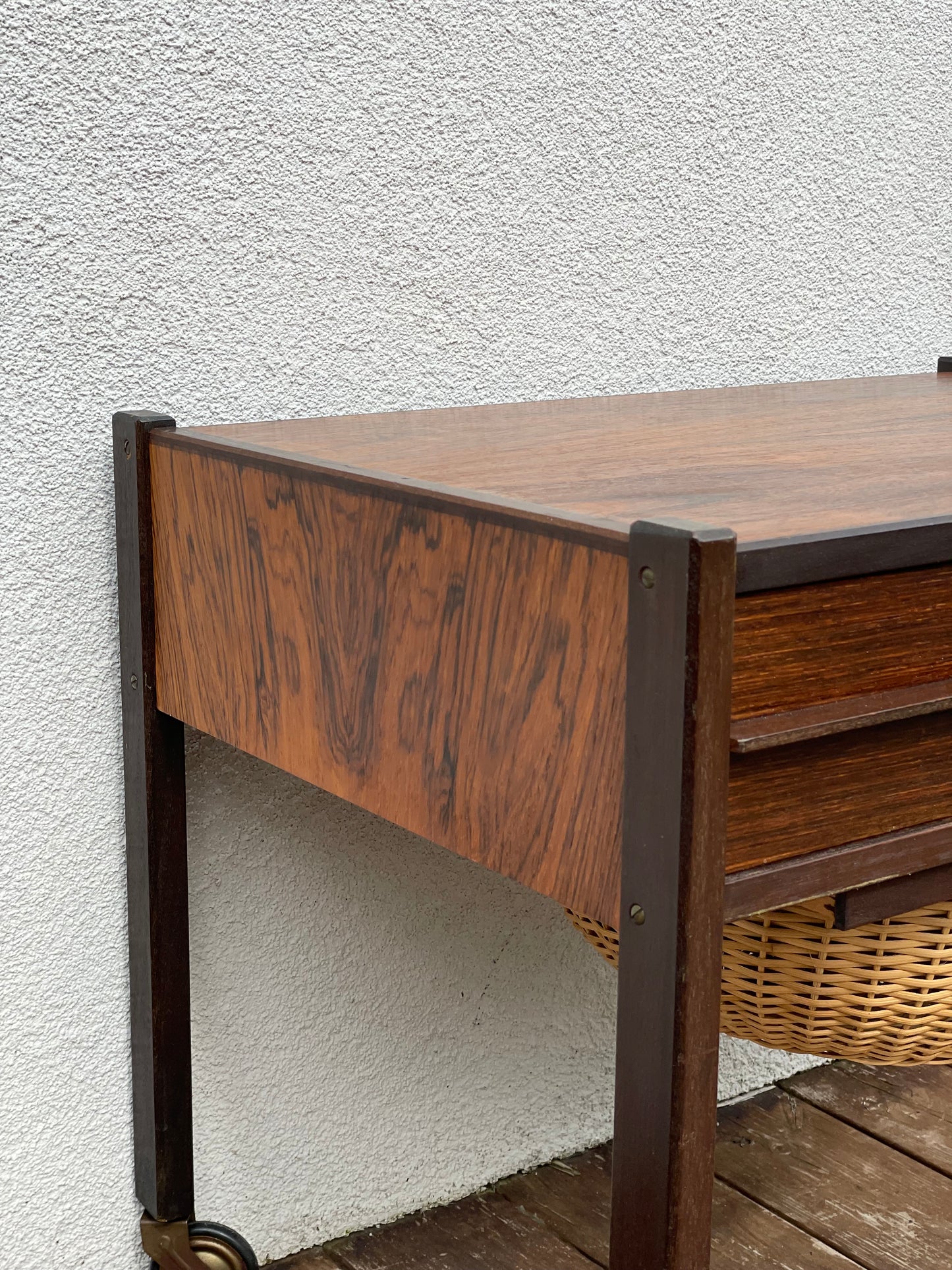 Rosewood side table with basket