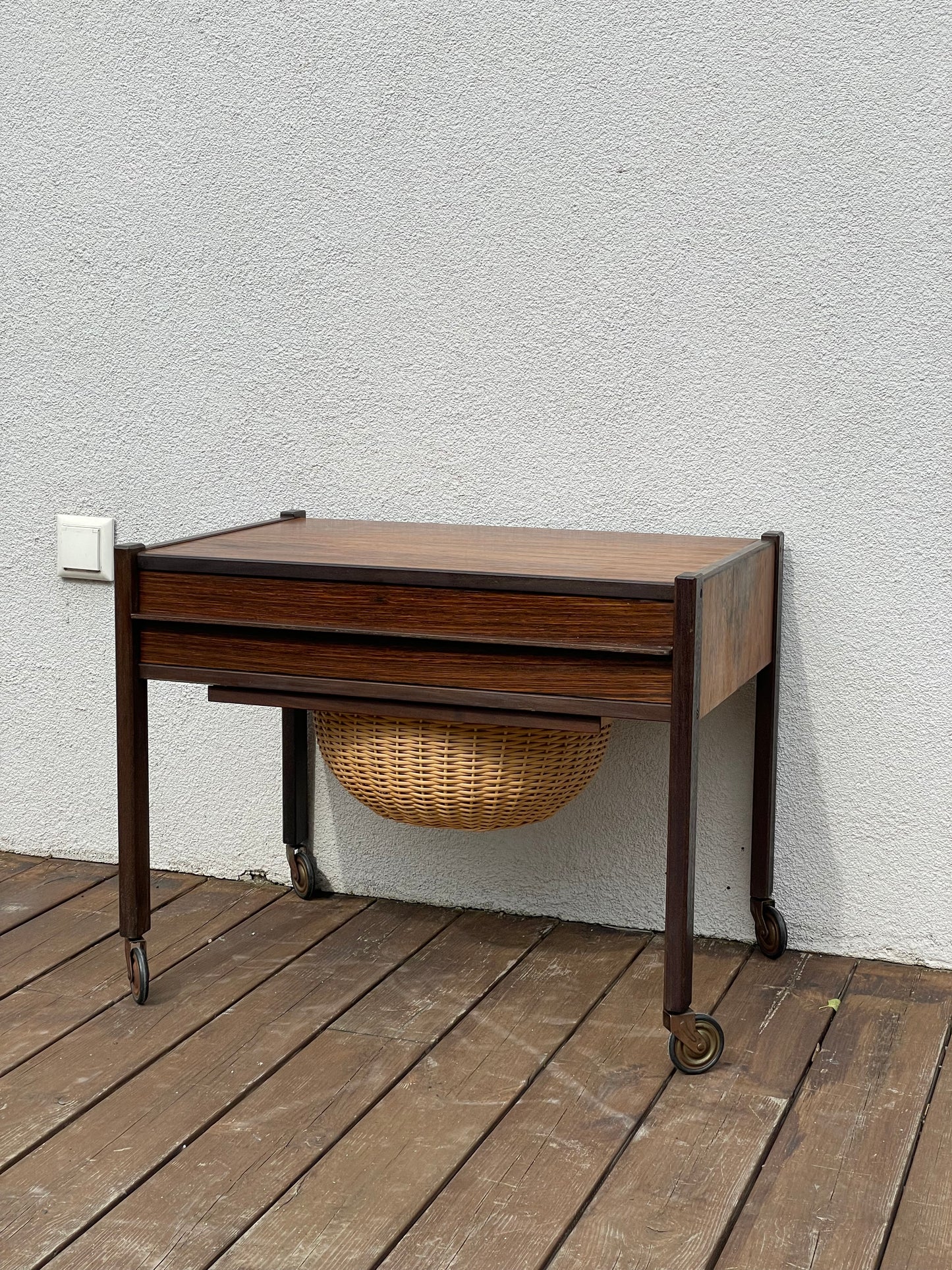 Rosewood side table with basket