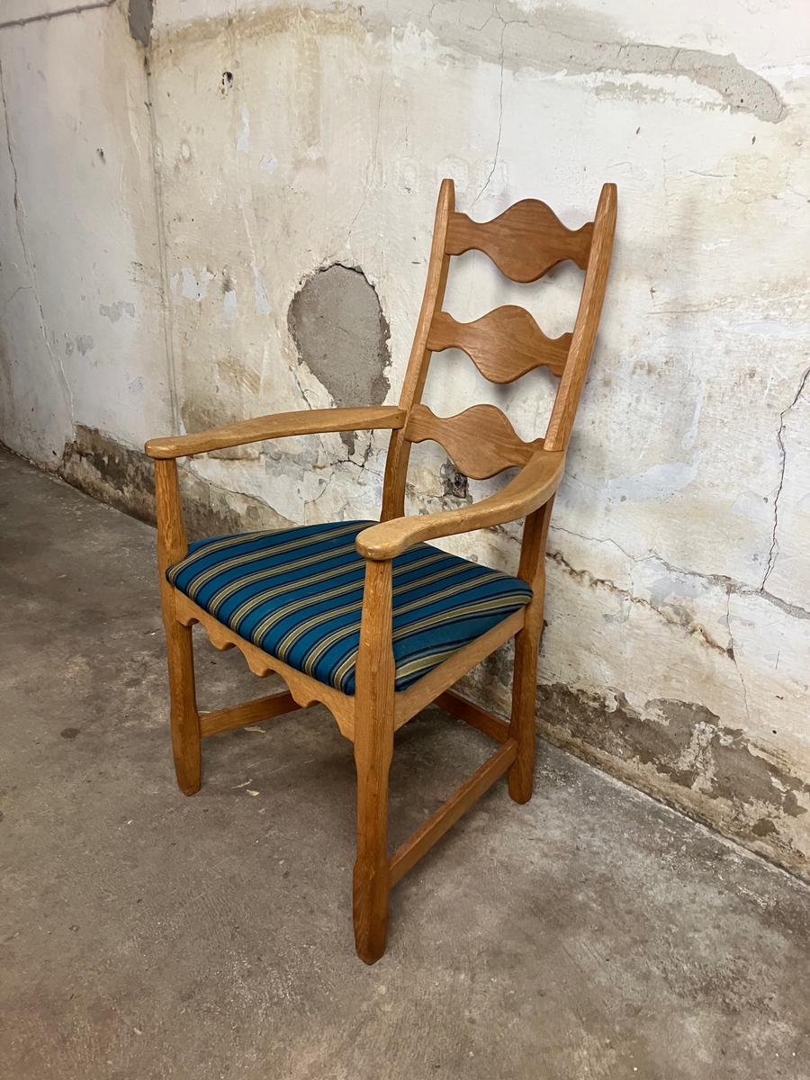 Highback carved oak armchair by Henning Kjærnulf