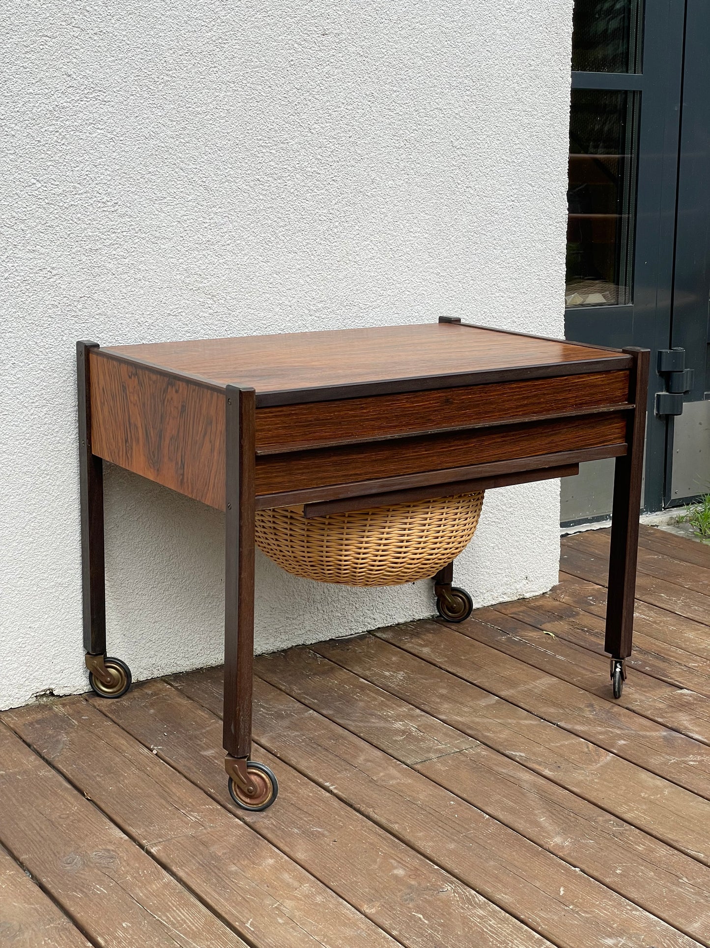 Rosewood side table with basket