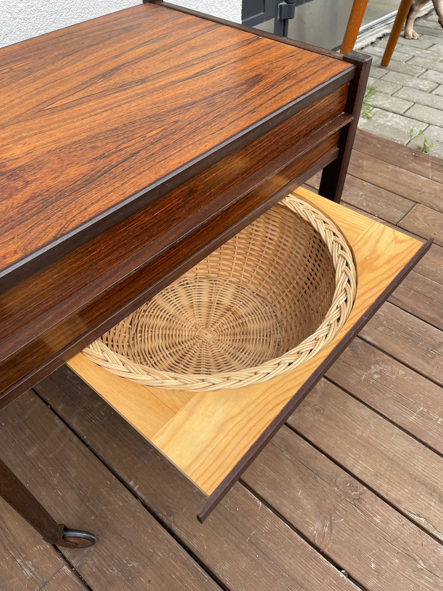 Rosewood side table with basket