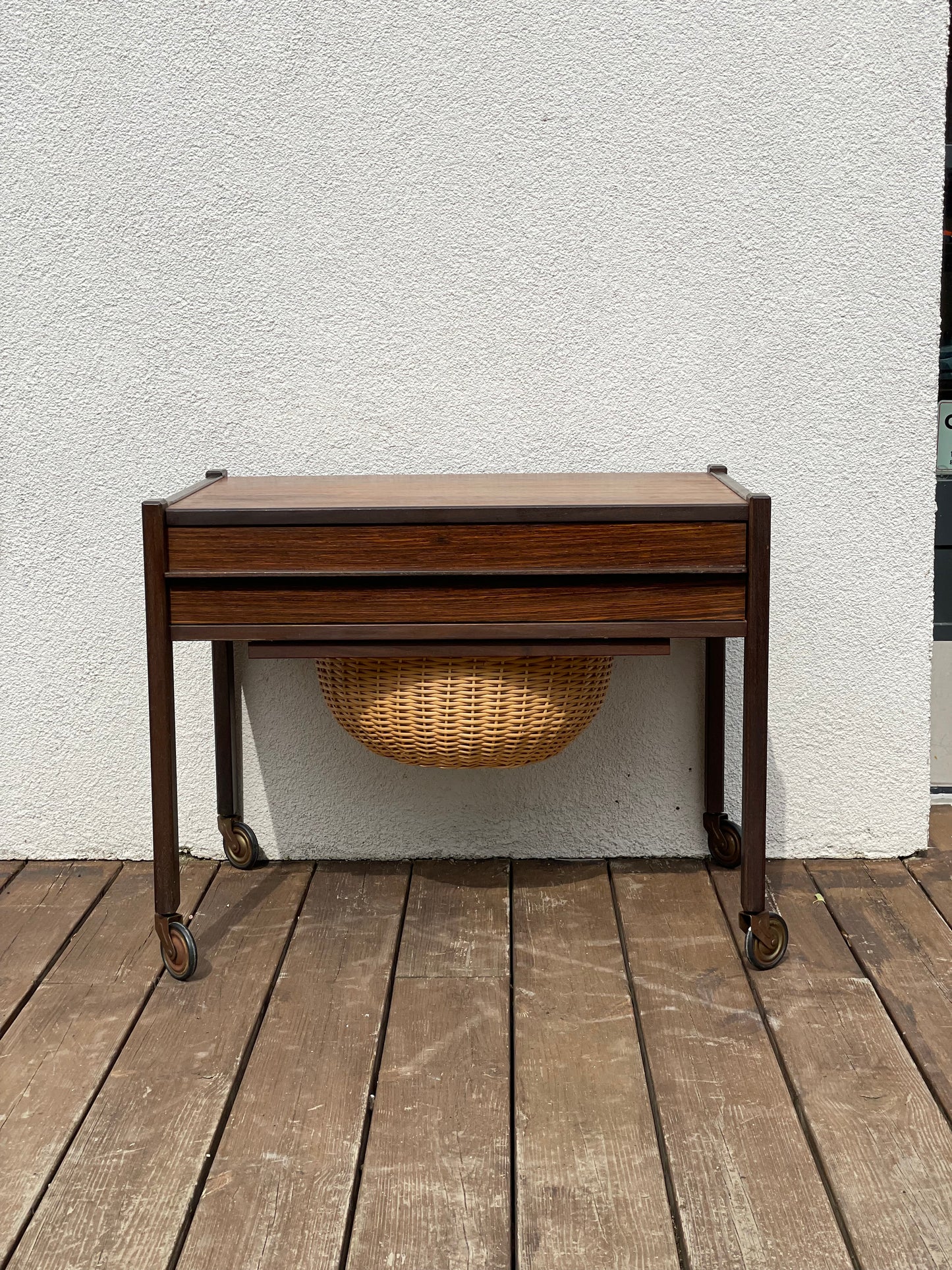 Rosewood side table with basket