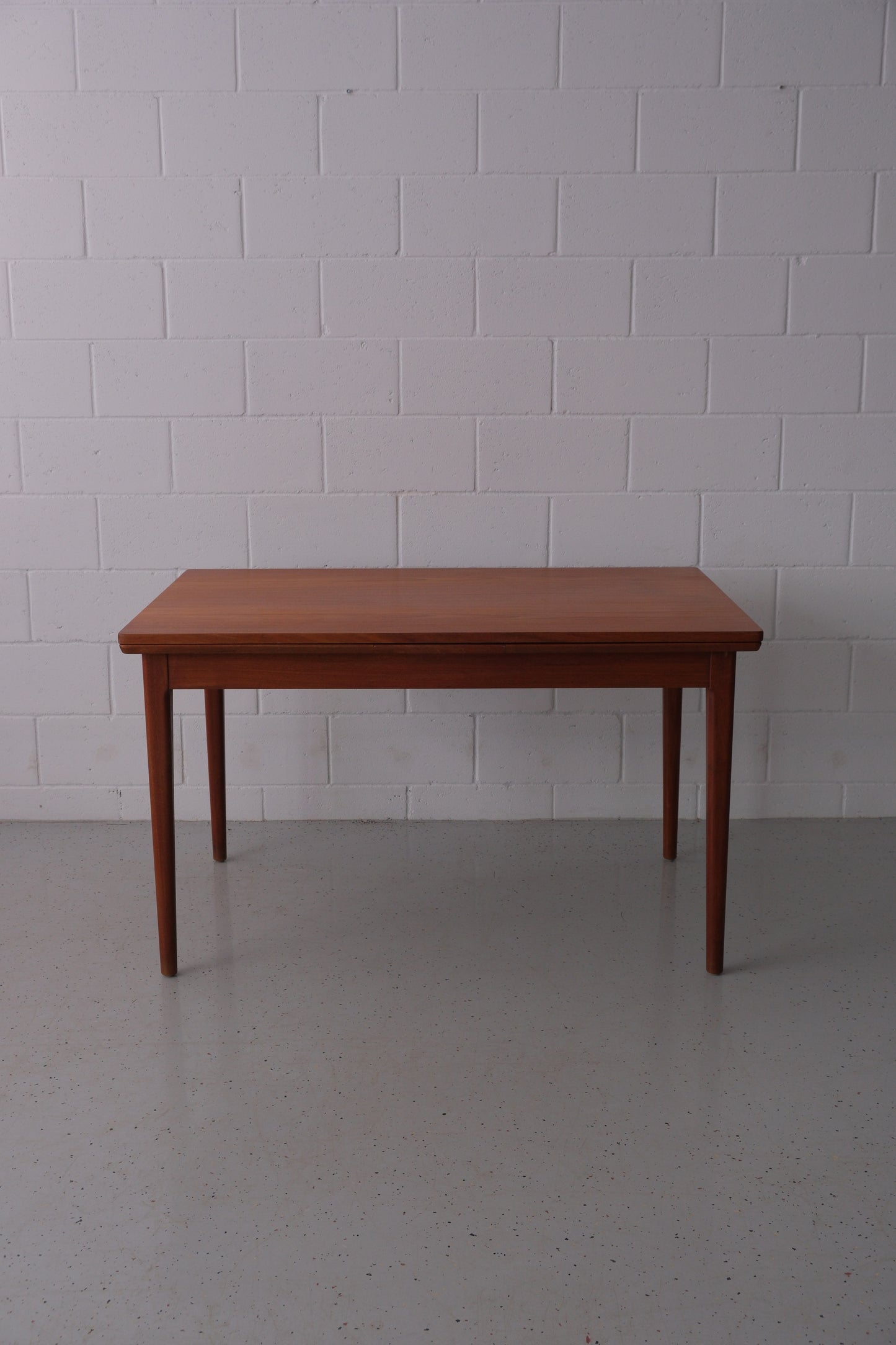 Danish teak dining table with dutch extensions