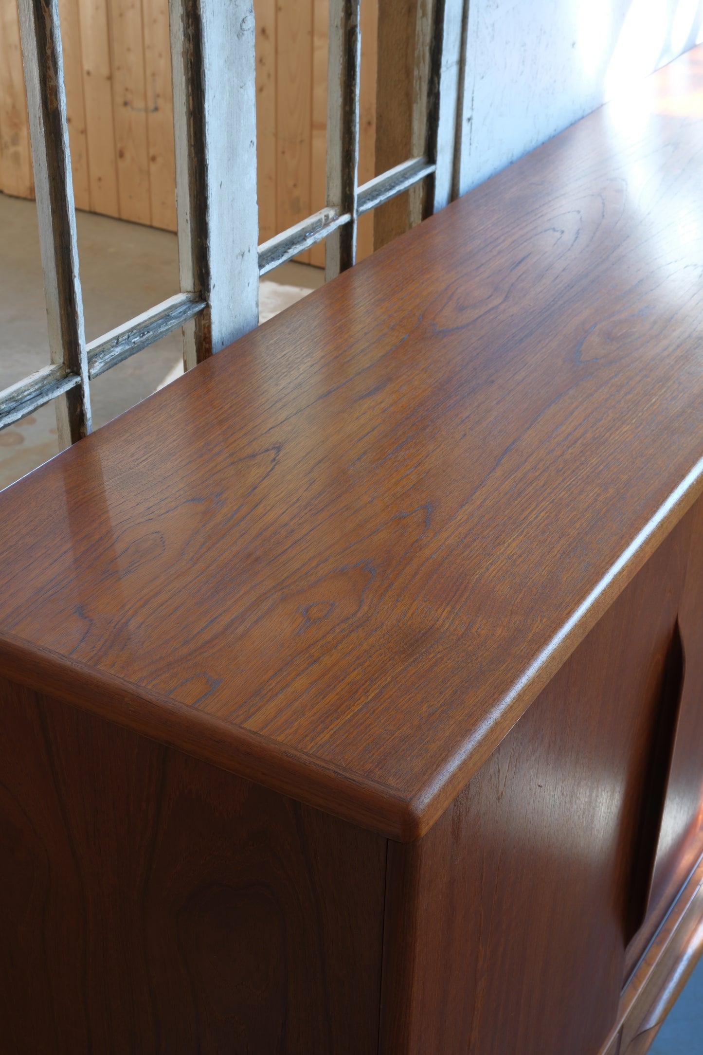 Johannes Andersen for Uldum Møbler. Teak sideboard, model 'UM-14'