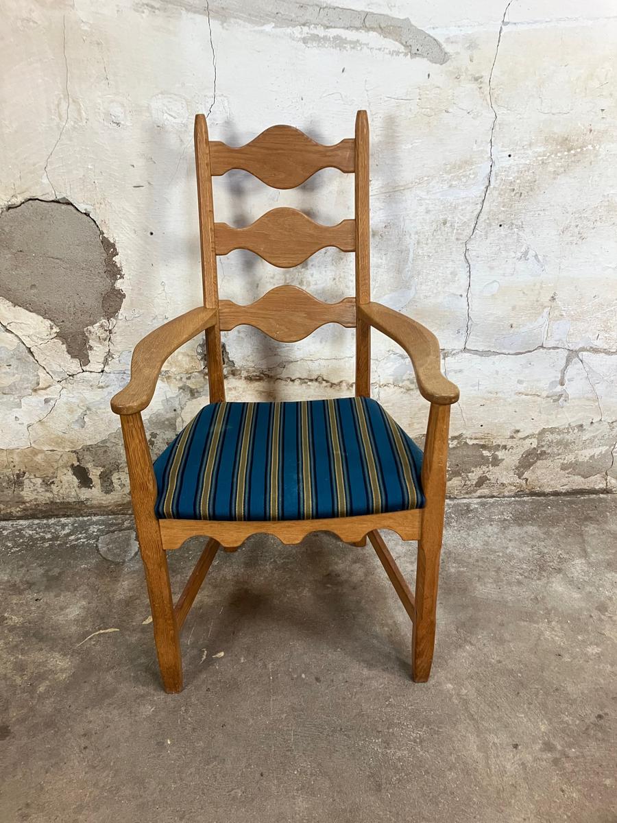 Highback carved oak armchair by Henning Kjærnulf