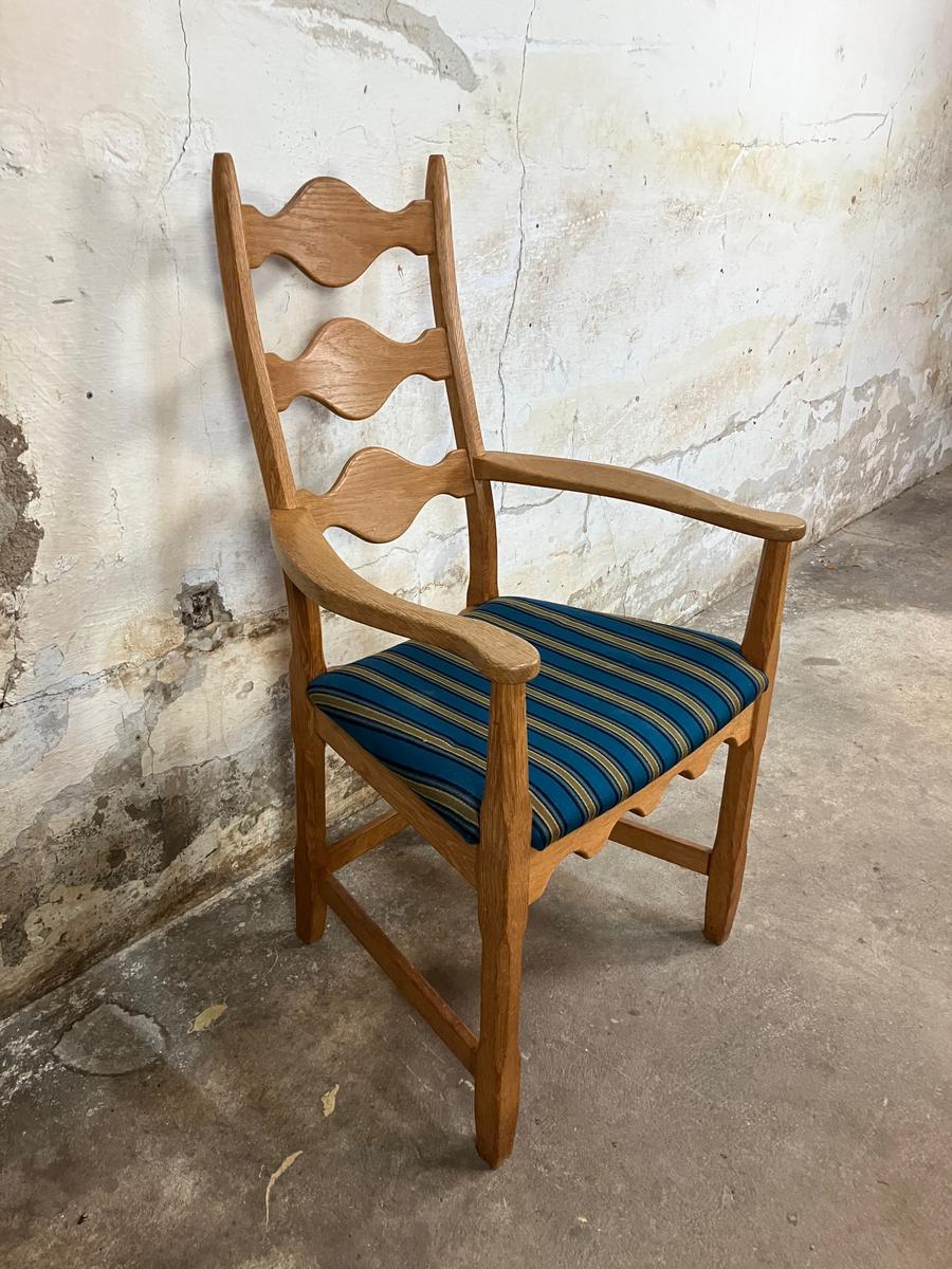 Highback carved oak armchair by Henning Kjærnulf