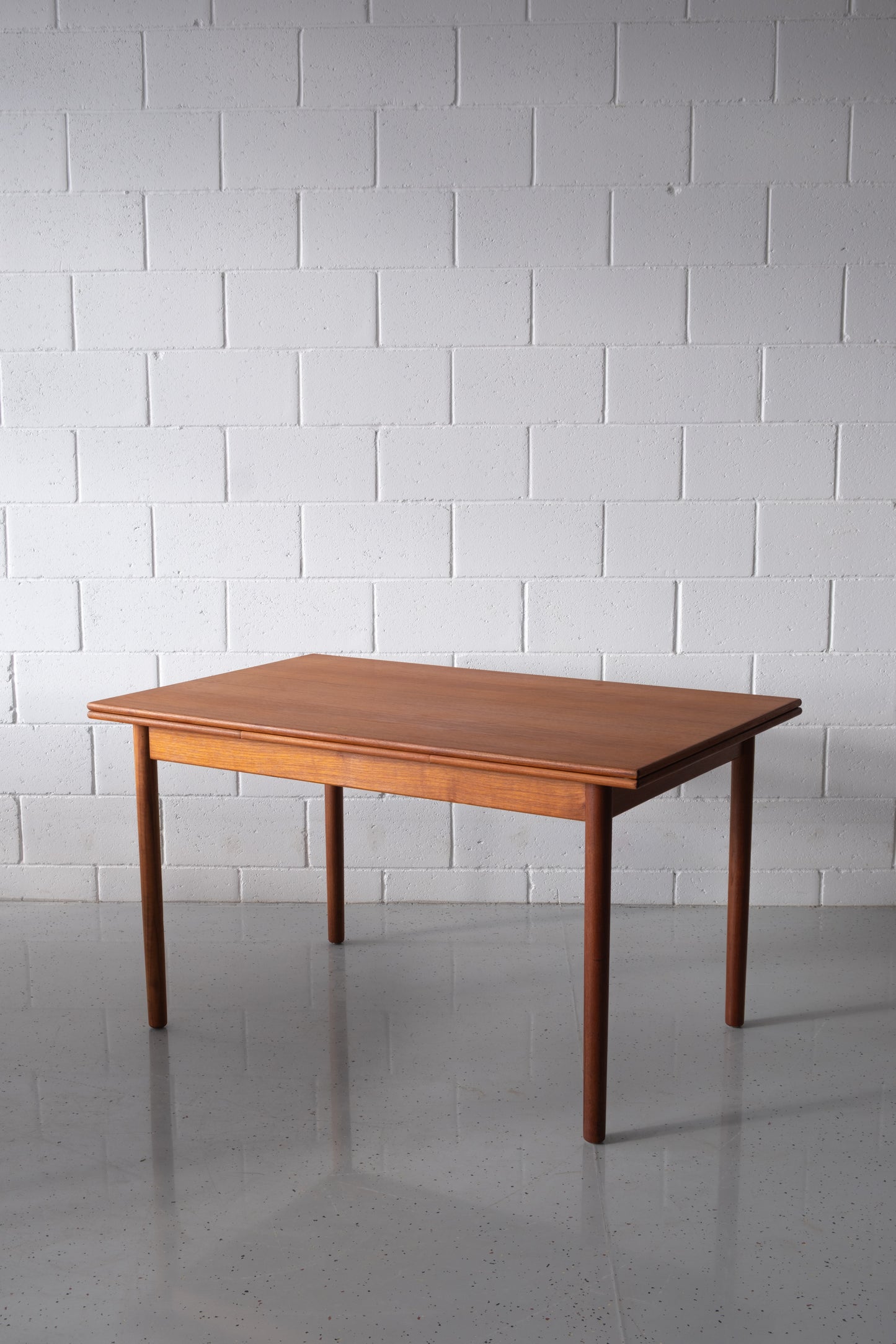 Danish teak dining table with extensions