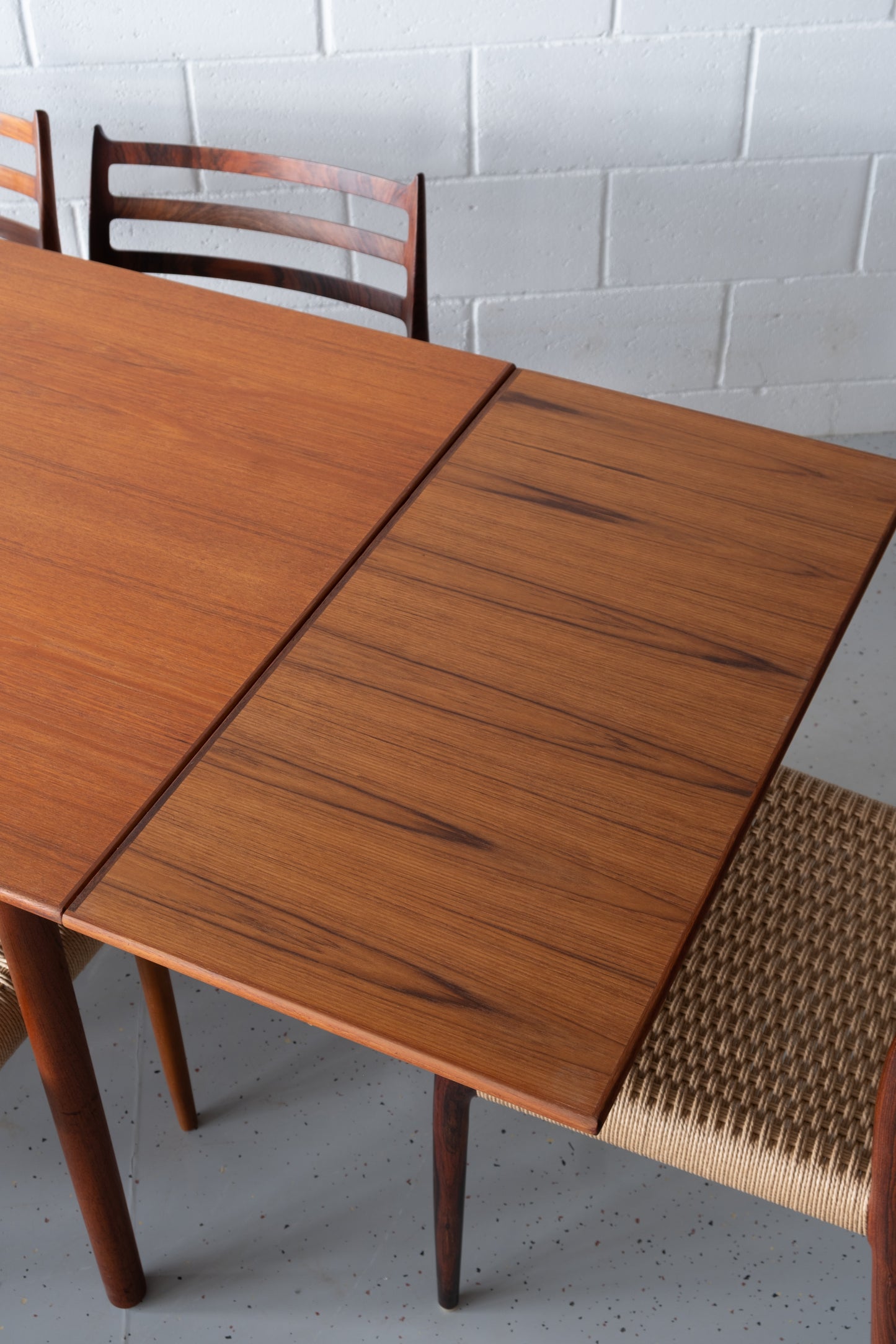 Danish teak dining table with extensions