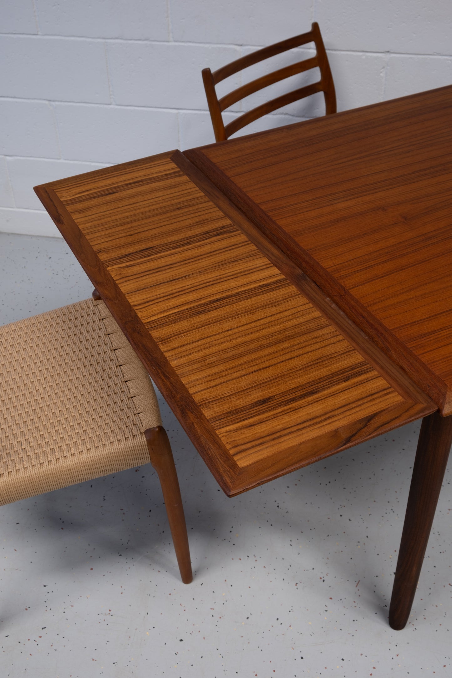 Danish teak square dining table with dutch extensions