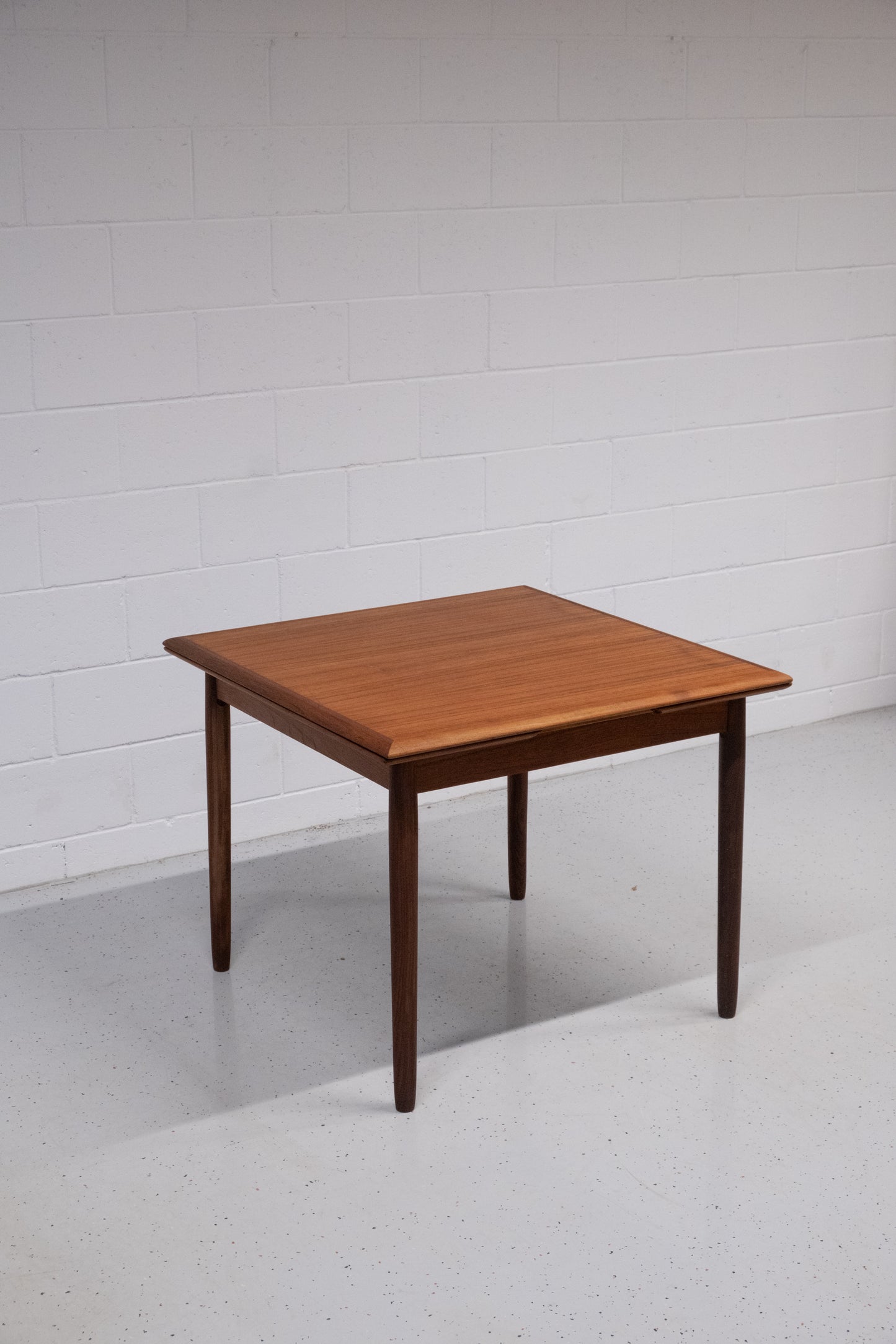 Danish teak square dining table with dutch extensions