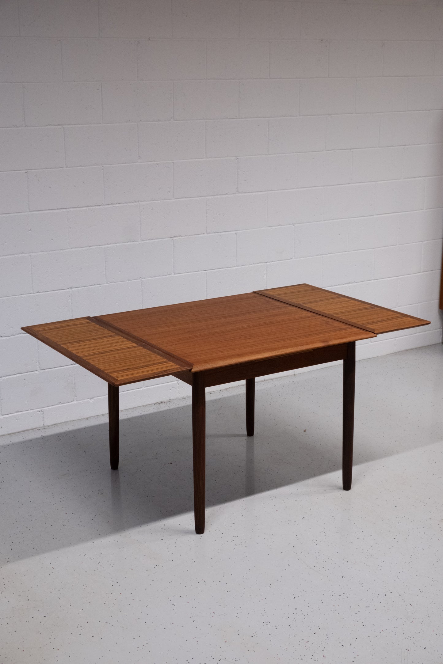 Danish teak square dining table with dutch extensions