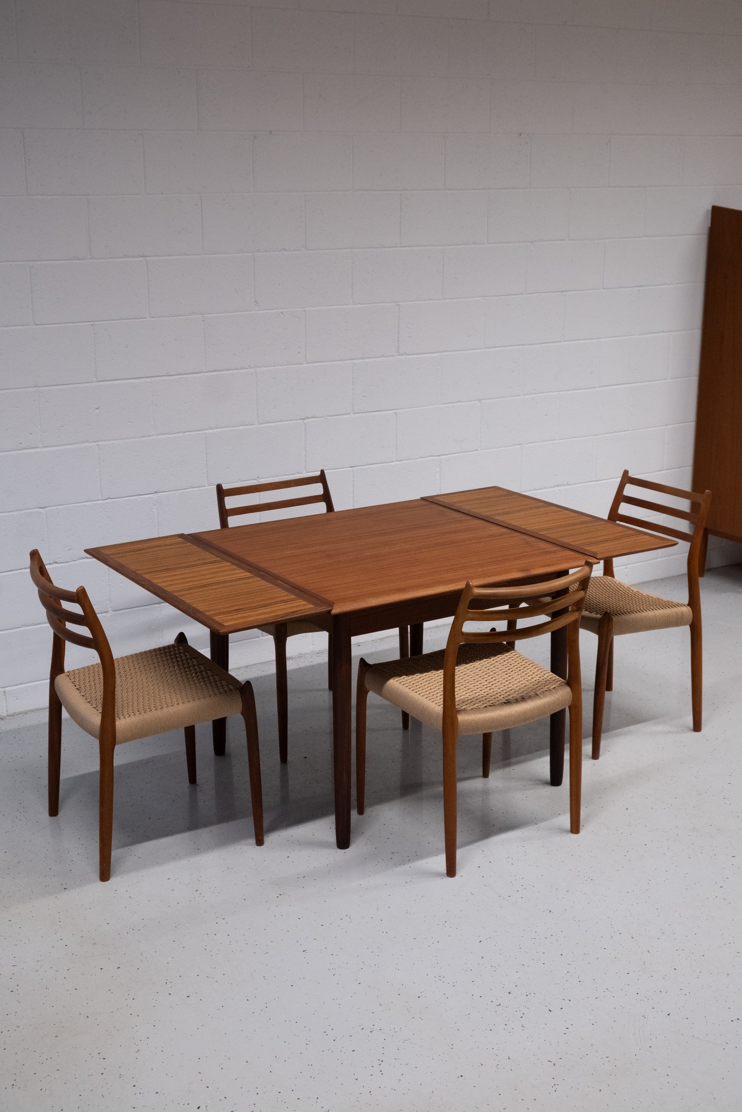 Danish teak square dining table with dutch extensions