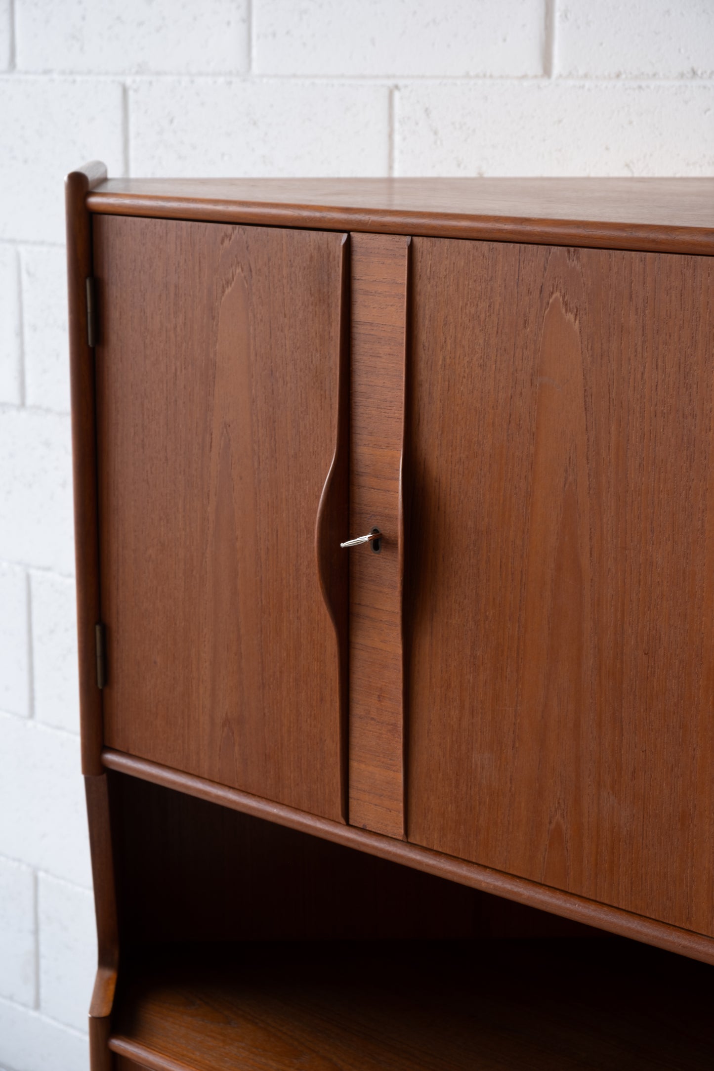 Teak corner cabinet with bar