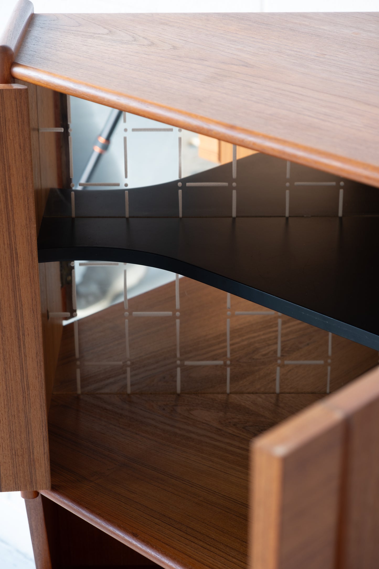 Teak corner cabinet with bar