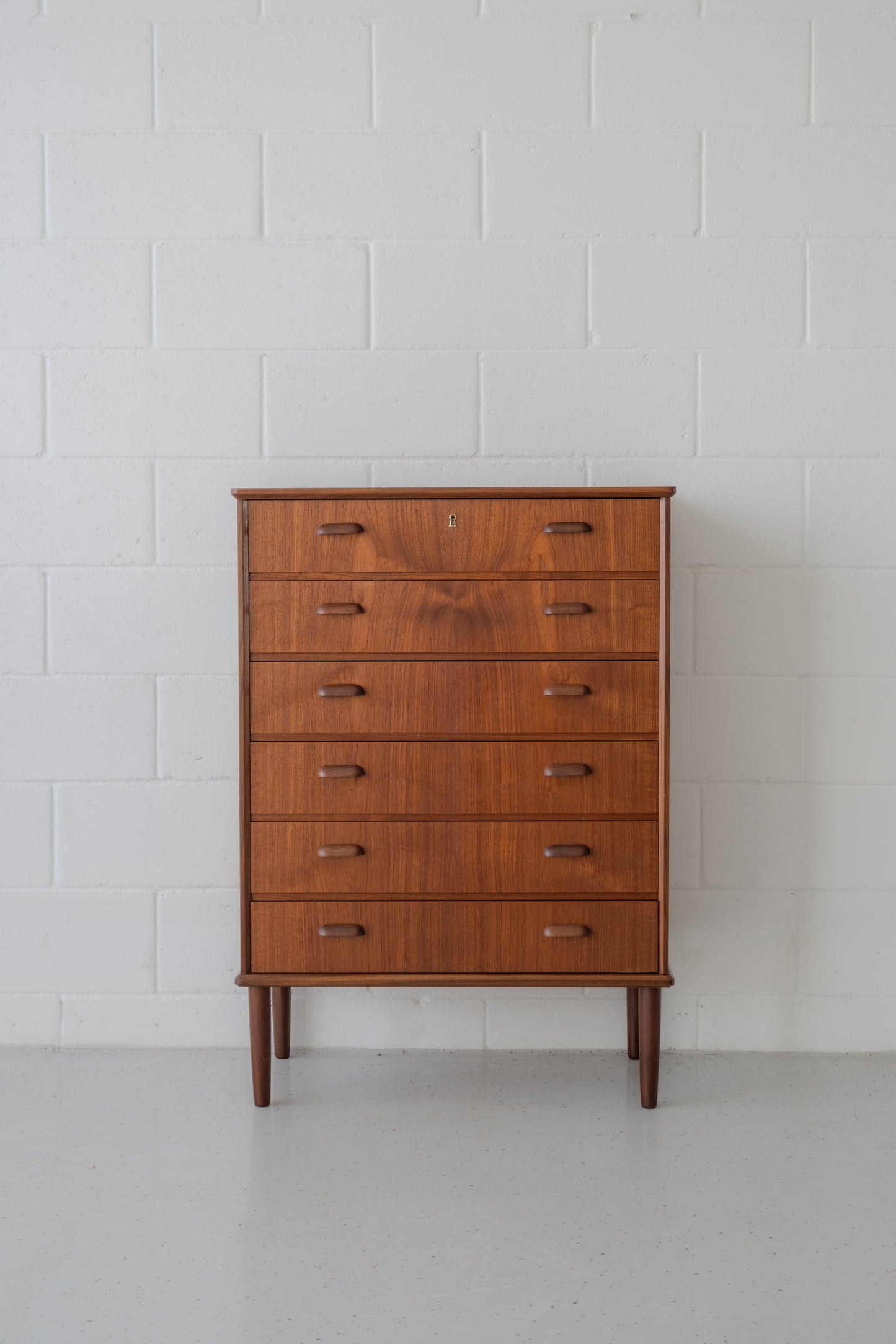 Teak tallboy