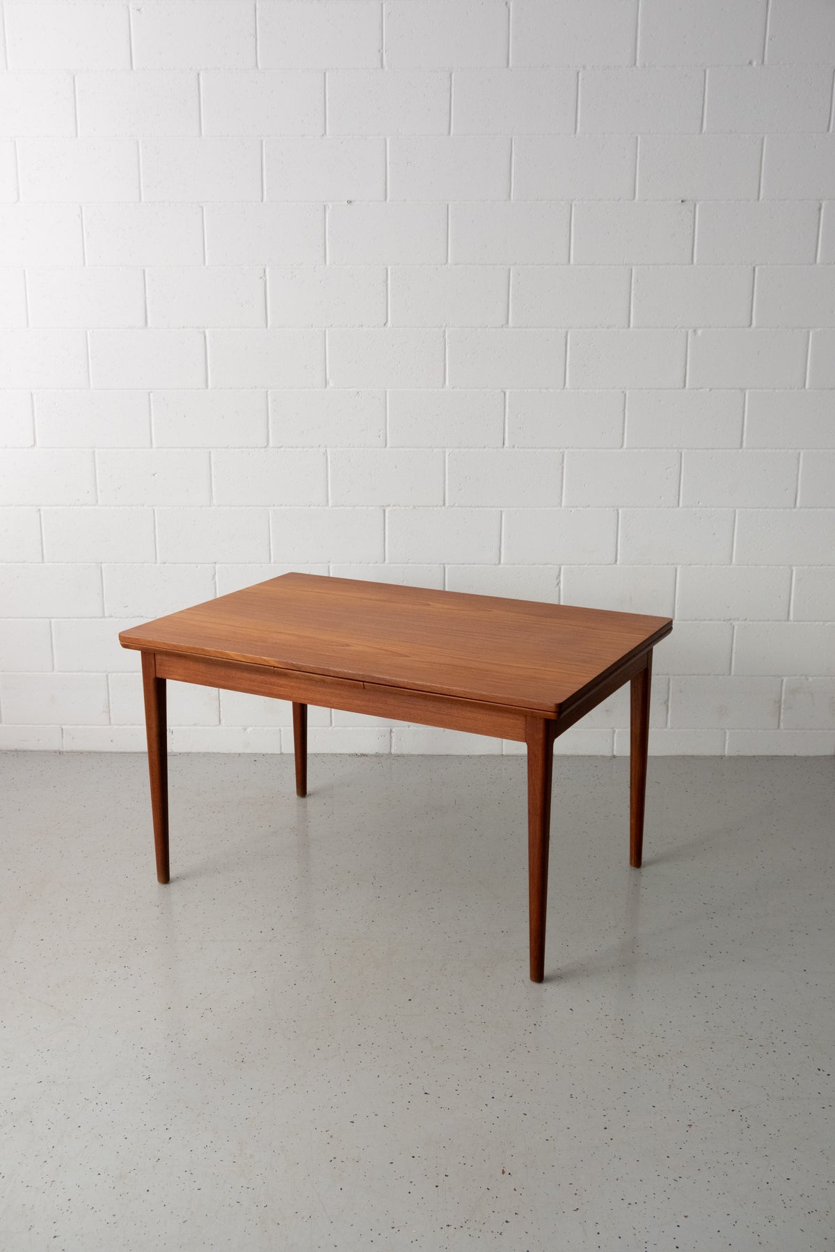 Danish teak dining table with dutch extensions