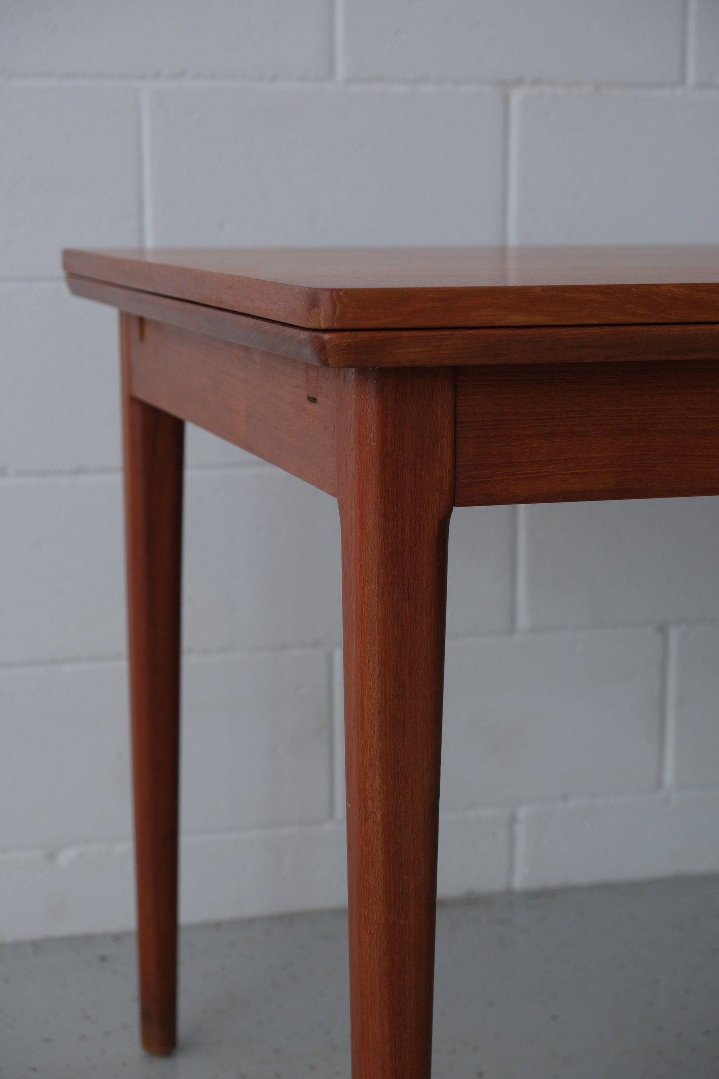 Danish teak dining table with dutch extensions