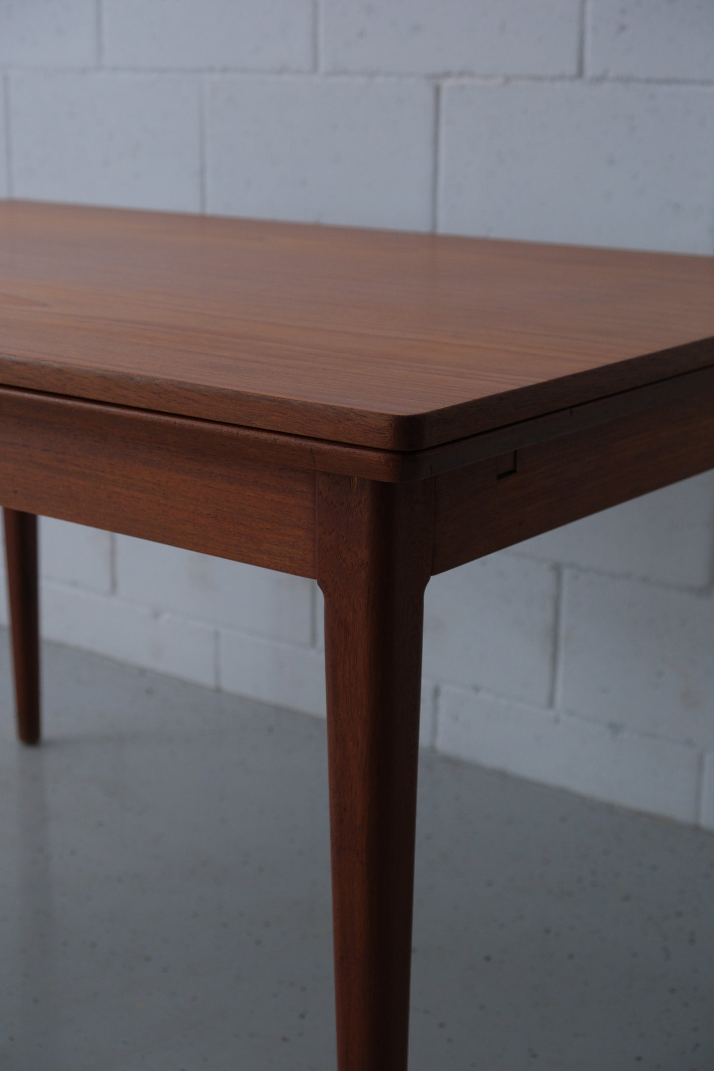 Danish teak dining table with dutch extensions