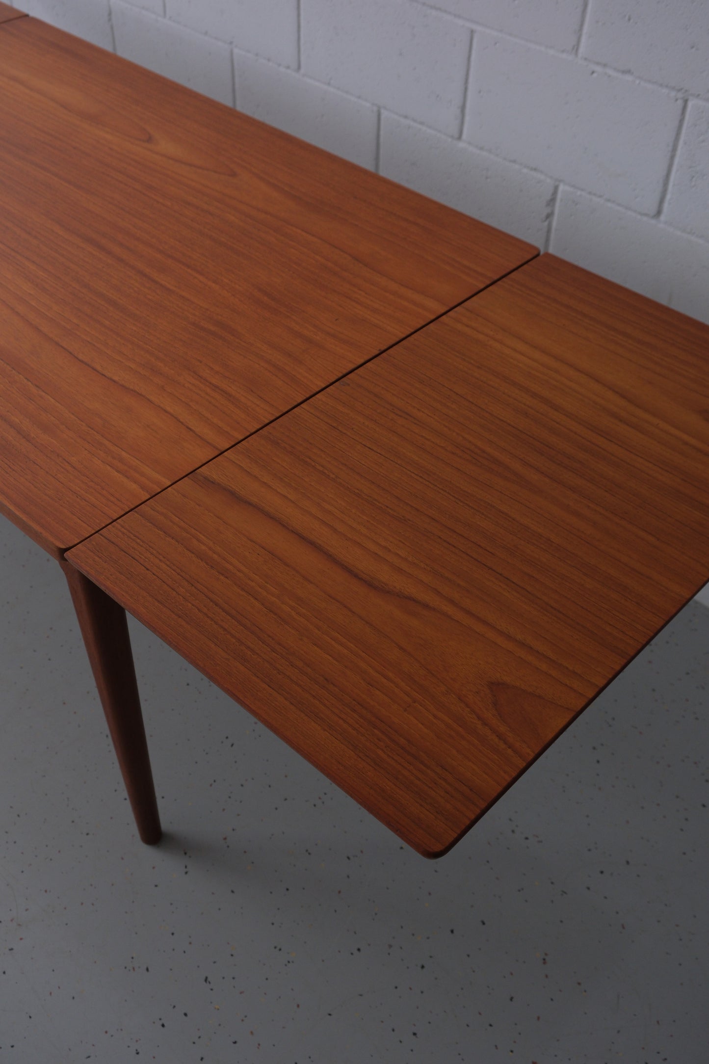 Danish teak dining table with dutch extensions