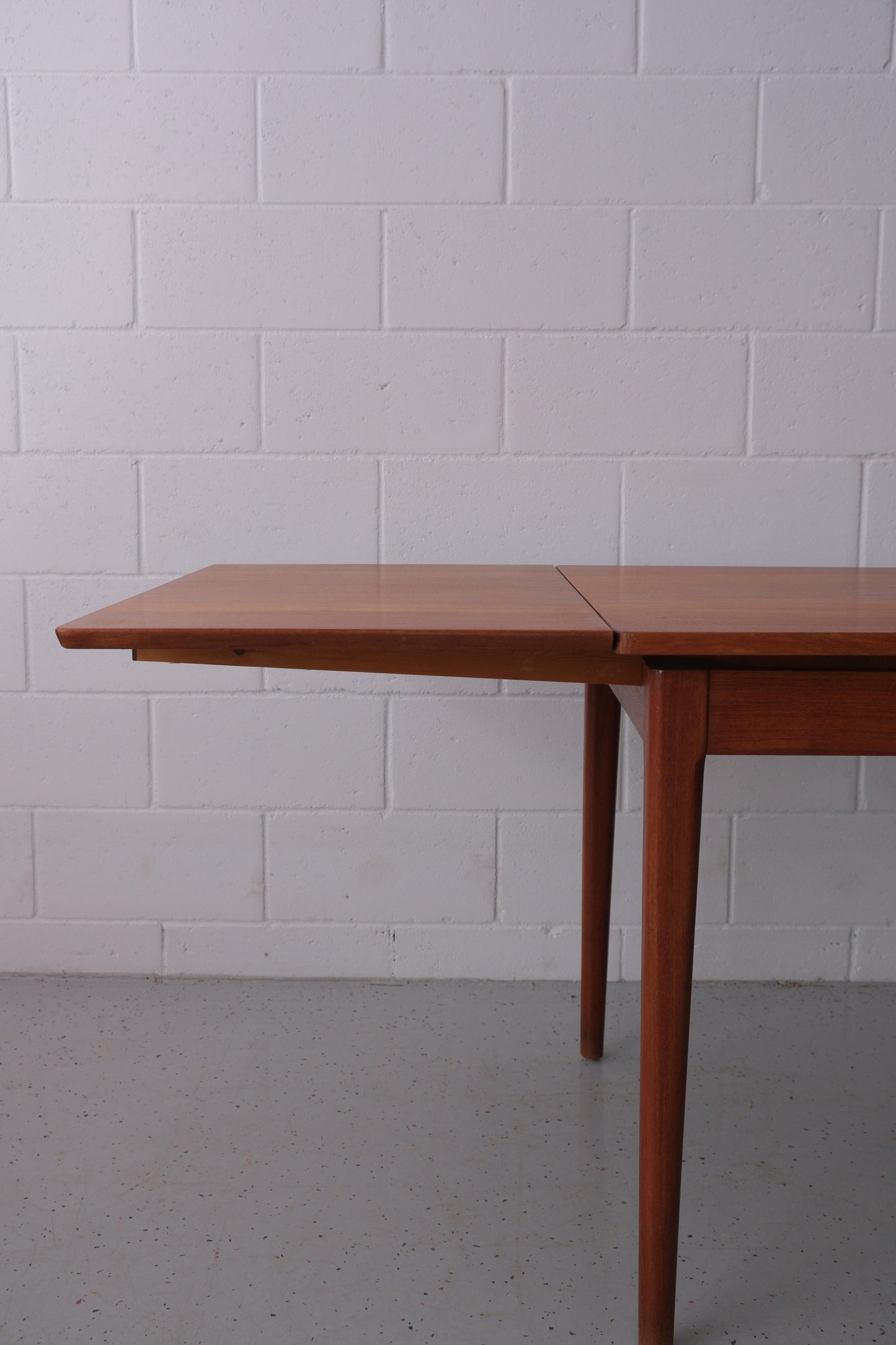 Danish teak dining table with dutch extensions