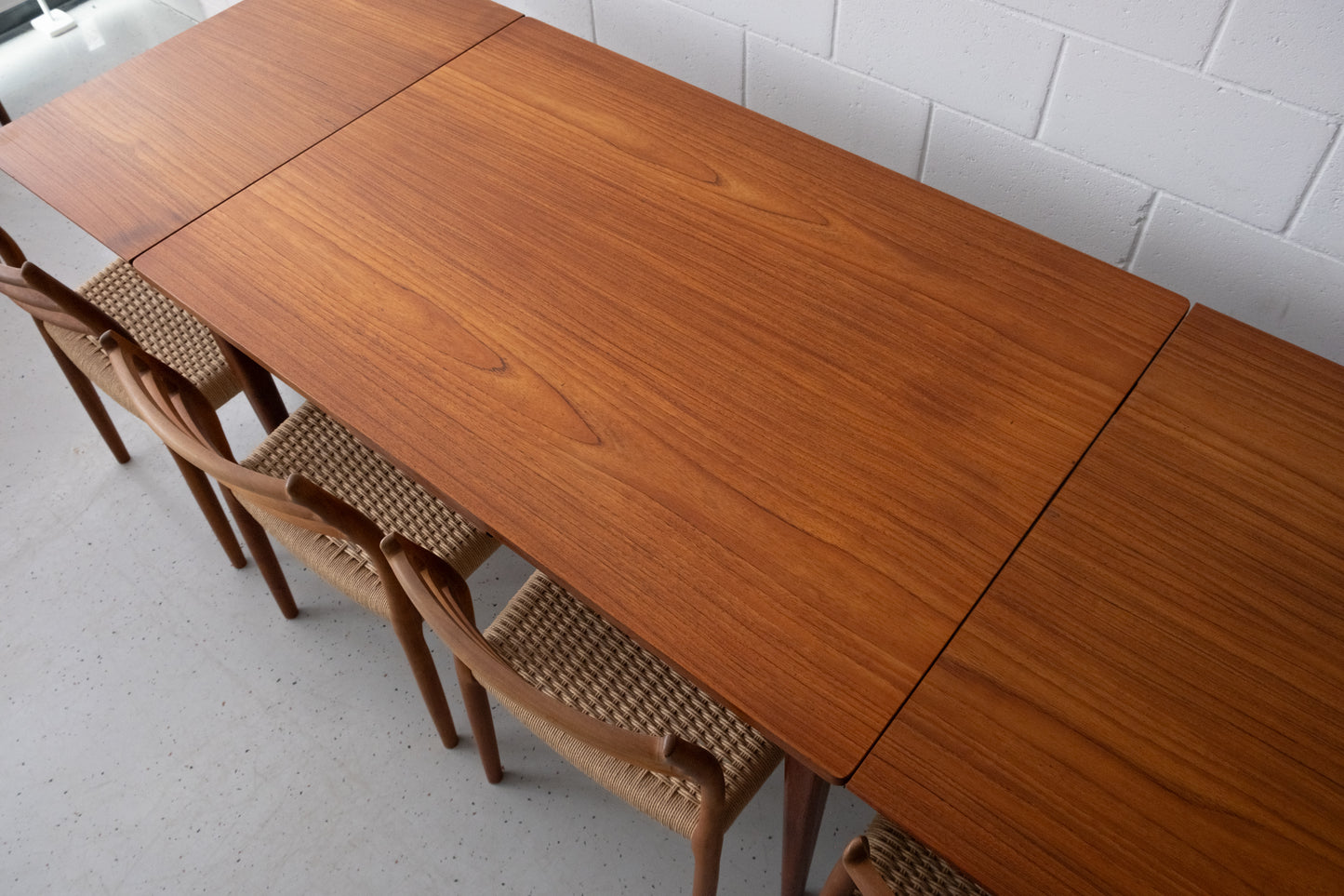 Danish teak dining table with dutch extensions