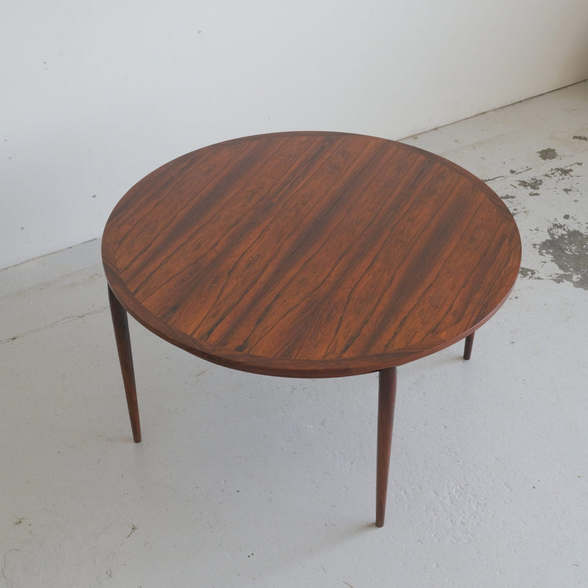 CJ Rosengaarden Rosewood dining table with 2 plates