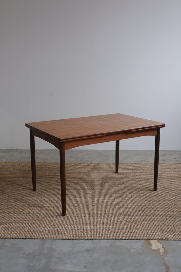 Danish teak table with dutch extensions