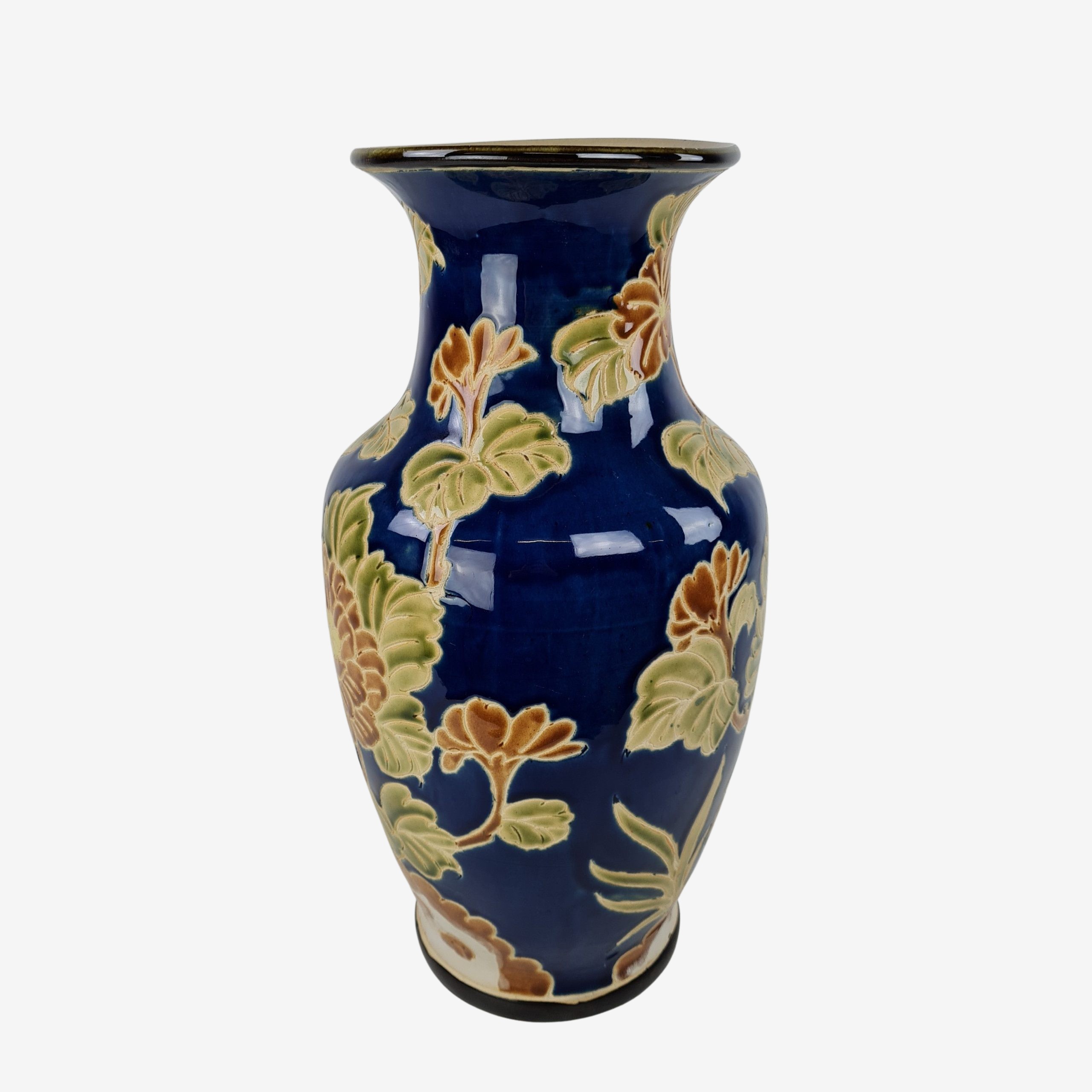 Ceramic floor vase with midnight blue glaze and decorated with flowers